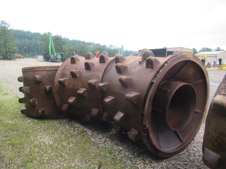 836G Compactor Wheels on a field Side view